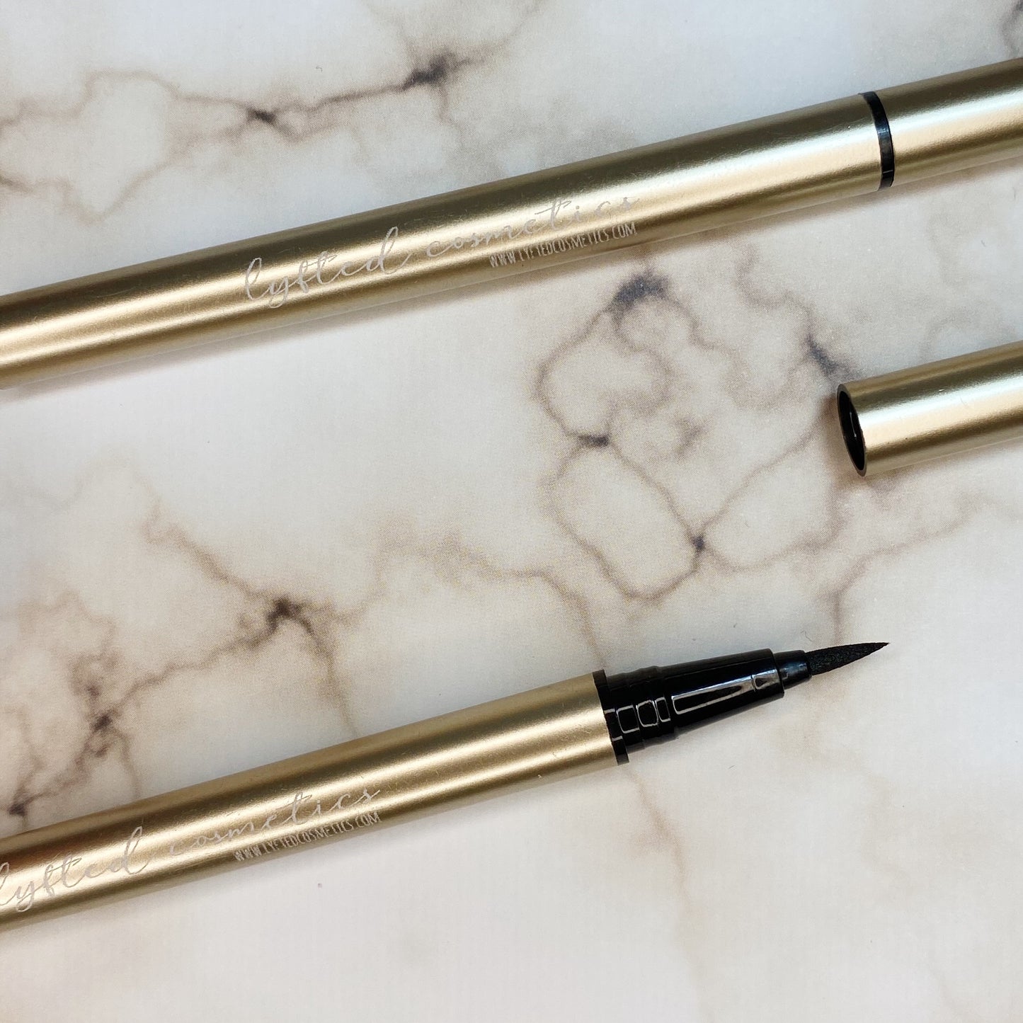 Dark Adhesive Lash Liner (Gold)